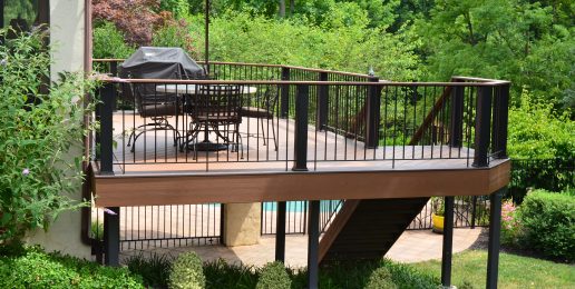 custom deck with staircase to pool
